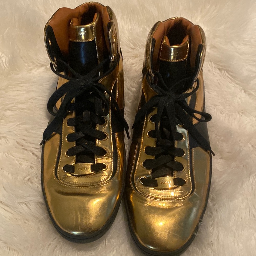 Used gold  & black Bally size 10
